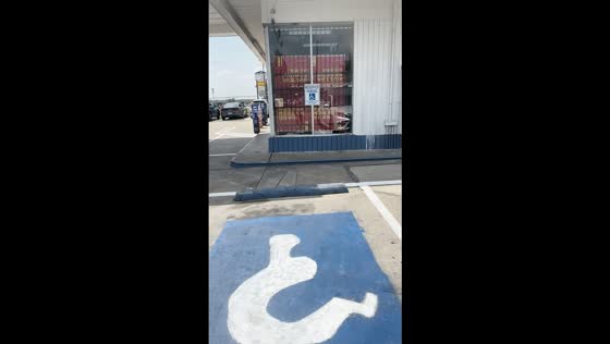Unusual wheelchair parking sign spotted in Dallas, Texas, USA