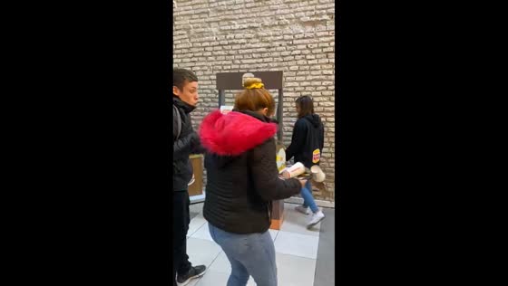  Guy bumps into woman with tray after losing game in Rosario, Santa Fe, Argentina