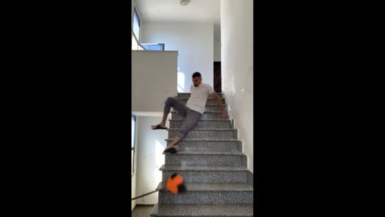 Man slips down stairs in Nablus, West Bank, Palestine