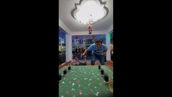 Woman falls during drinking race game in Villavicencio, Colombia
