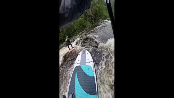 Exciting paddle boarding adventure on River Tummel in Pitlochry, Scotland, UK