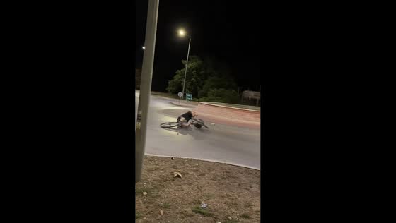 Cyclist falls while riding around roundabout in Sarkad, Hungary