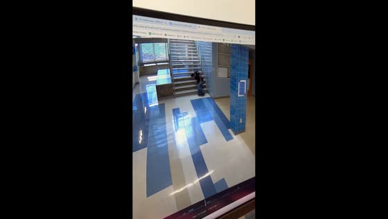 Teen slips and rolls down school stairs but quickly recovers in Austin, Texas, USA