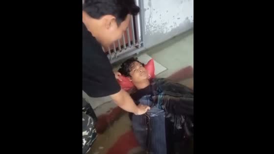 Terrifying flood in Makassar, Indonesia - sleeping guy almost drowns