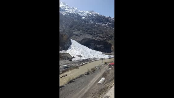 Massive avalanche flows down mountain into river in Hakkari, Turkey