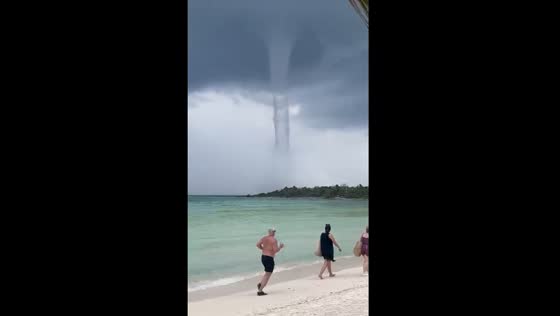 Water spout hovers over Playa del Carmen Shore