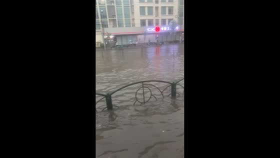 Major street flooding follows heavy rain in Shanghai, China