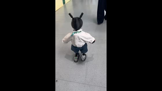 Mini Pi humanoid robot shows off its tiny steps in Beijing, China