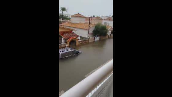 Floodwaters engulf homes and leave cars submerged as Storm Adam hits Piles, Spain
