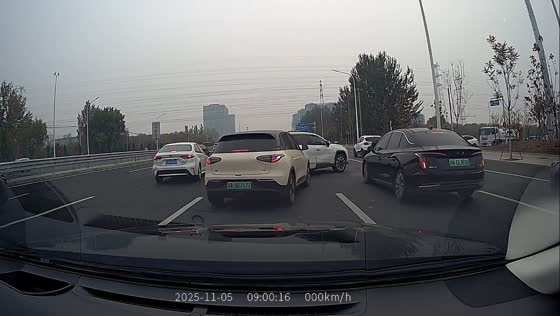 White car crashes into pole after sudden lane cut in Beijing, China