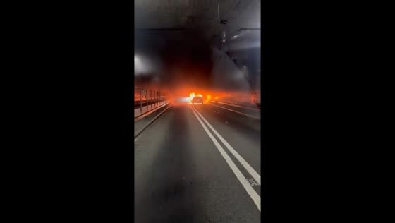 Car fire blocks all lanes in Lincoln Tunnel during rush hour in New Jersey, USA