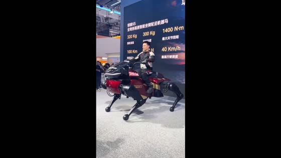 Man rides a robotic horse during a demonstration in Guangdong, China