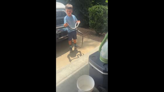 Boy catches snake in garage in Seneca, South Carolina