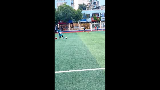 Child slips on soccer ball during game in Anhui, China