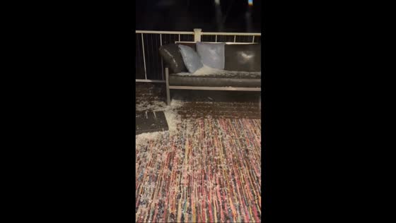 Heavy hailstorm covers balcony in Woodbury, Minnesota, USA