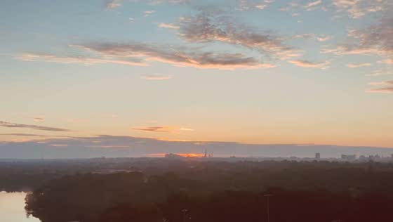 Serene sunrise over the city skyline in Cambridge, Massachusetts, USA