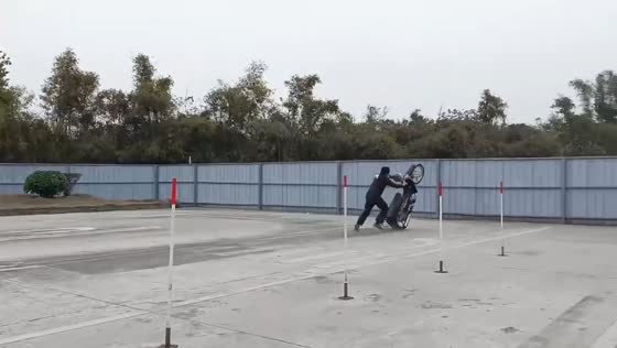 Man loses control during wheelie attempt in Guangxi, China