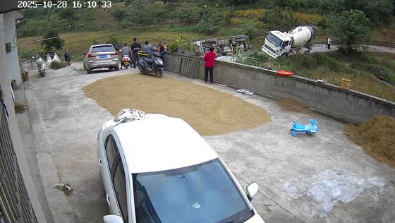 Two mixer trucks overturn on narrow rural road in Guangdong, China