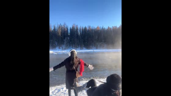 Failed playful kick attempt on snowy lake in Xinjiang, China