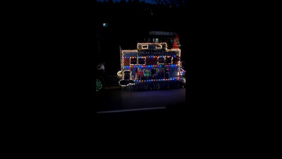 Christmas parade float causes laughter in Angels Camp, California, USA