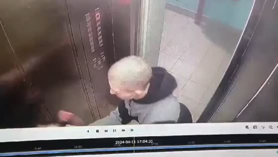 Phone snatched from child in elevator; suspect detained