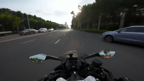 Motorcycle and car collide at intersection in Shandong, China