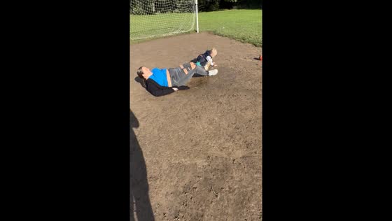Parent's slip in puddle leads to hilarious fall with child