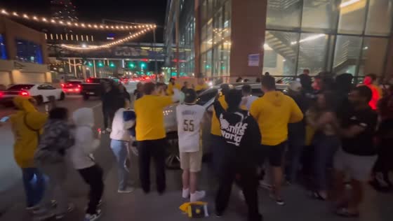 Indiana Pacers fans cheer for players and coach outside arena in Indiana, USA