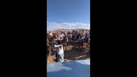 Horseback proposal surprises crowd during race in Stagecoach, Nevada
