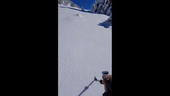 Walking through deep snow in Isaba, Navarrese Pyrenees, Spain