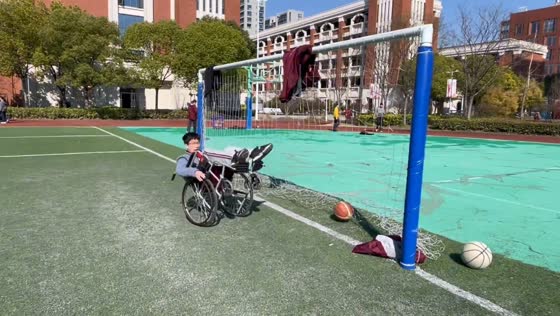 Wheelchair goalkeeper falls while trying to block a goal in Shanghai, China