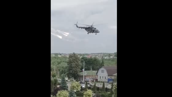 Russian helicopter deploying thermal decoys above residential areas