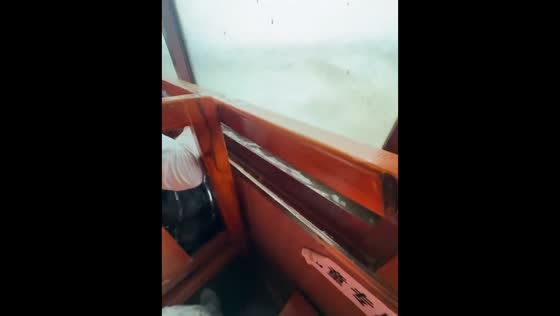 Sudden storm turns sightseeing boat trip dangerous in Huanghua, Hebei, China