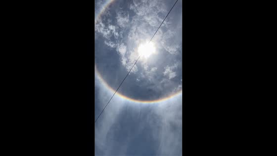 Stunning 22-degree sun halo with faint rainbow in Rosario de la Frontera, Argentina