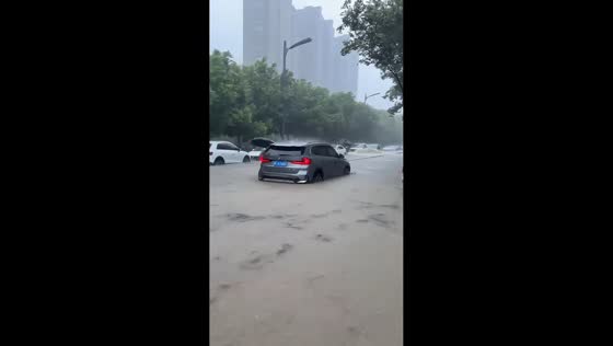 Severe flooding submerges vehicles and inundates roads in Zhejiang, China