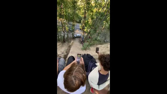 Bicycle mishap on cliff in Kyiv, Ukraine