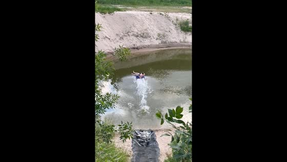 Uncle's epic slide: skimming over cold waters