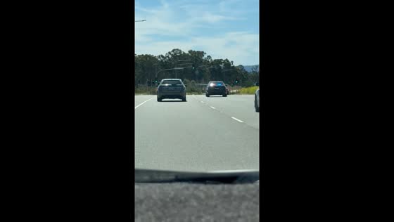 Undercover police intercept speeding driver on highway in Bringelly, Australia