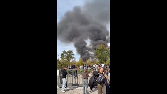 Black smoke rises after fire during high school blockade in Montbéliard, France