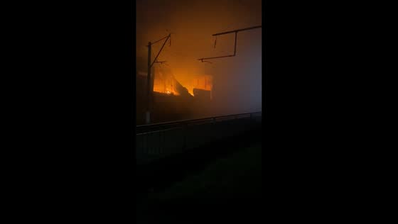 Massive blaze erupts at logistics warehouse following reported strikes in Boryspil, Ukraine