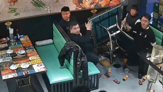 Drunk diner's table-turning tantrum: CCTV captures startling restaurant incident