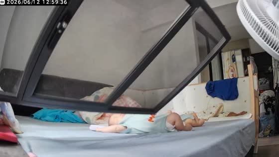 Window screen falls near sleeping baby at the bedroom in Guangdong, China