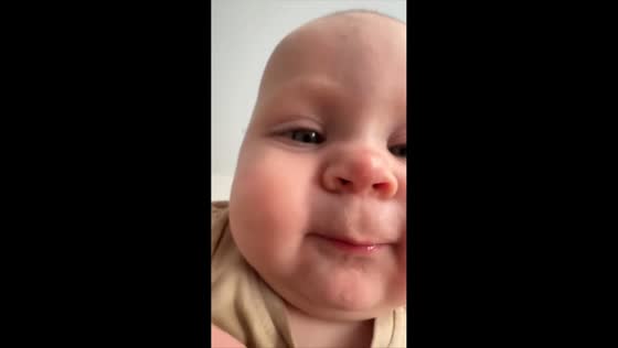 Baby kisses camera in Krasnodar, Russia