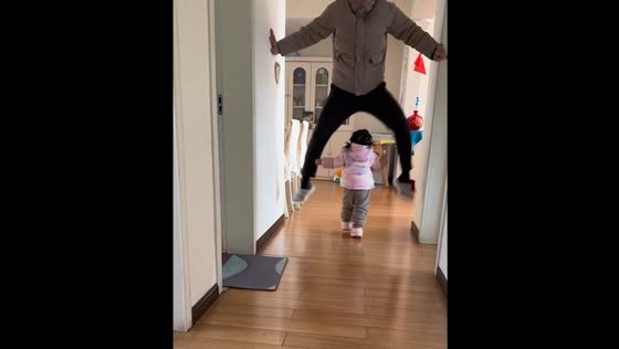 Dad jumps over child in unexpected moment