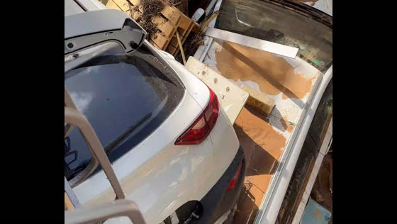 Flood leaves streets covered in mud and debris in Catarroja, Spain