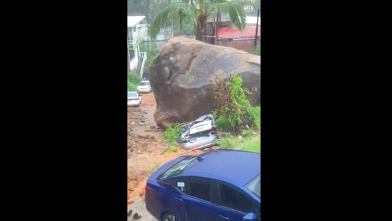 Boulder crushes car in Acapulco, Mexico