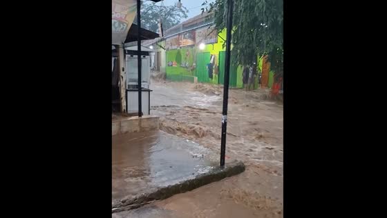 Flooding from Cigentis Waterfall in West Karawang, Indonesia