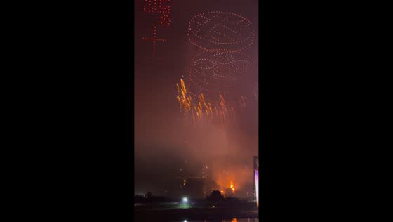Sparks ignite hillside fire during drone fireworks show in Liuyang, Hunan, China