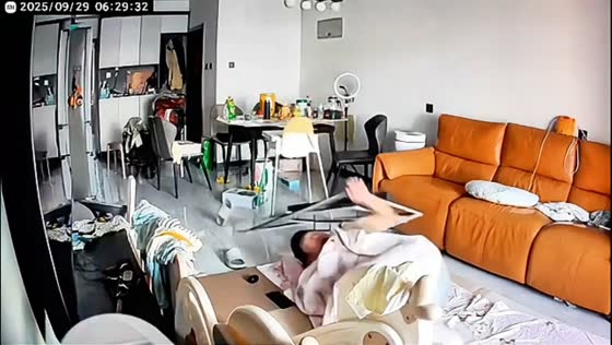 Ceiling light falls on sleeping man in Beijing, China