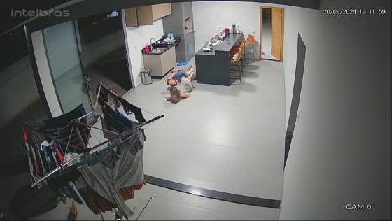 Husband and wife fall after lift in CCTV footage from Brazil